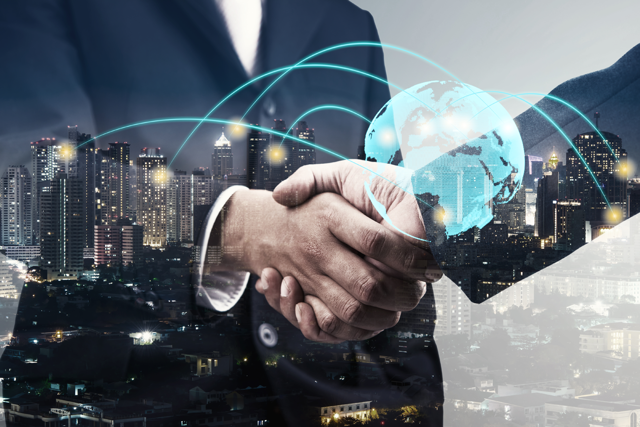 Global Business Partnership - Modern cityscape with handshake overlay